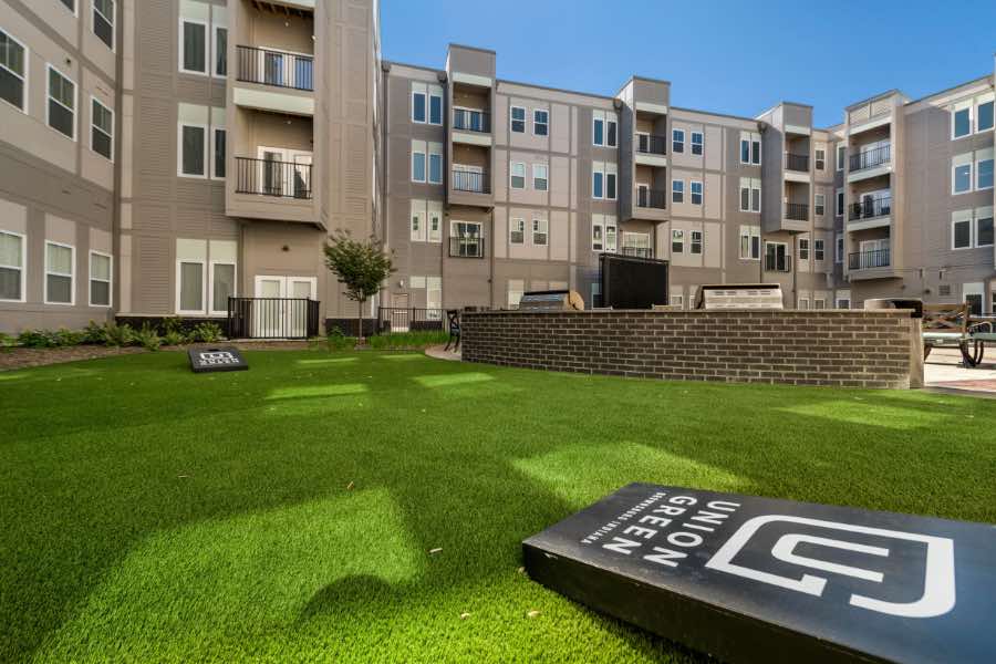 Amenities like this putting green at Union Green Apartments help develop a sense of community. Putting green at apartment community