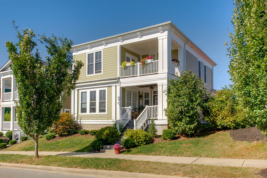 Apartments with large balconies like this one at City Flats at Renwick let you bring your garden outdoors. Exterior view of apartment with second-floor balcony