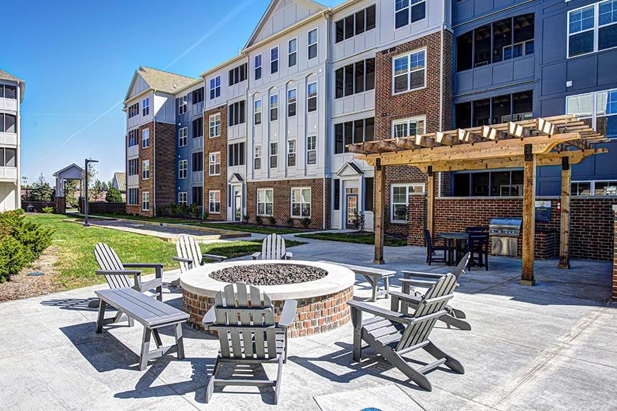 Outdoor fire pit and seating at Lakeside Apartments in Carmel